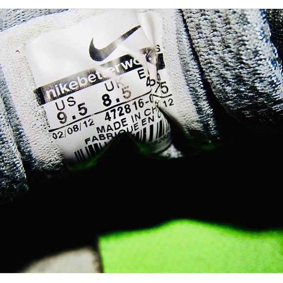 grey and neon green nike shoes